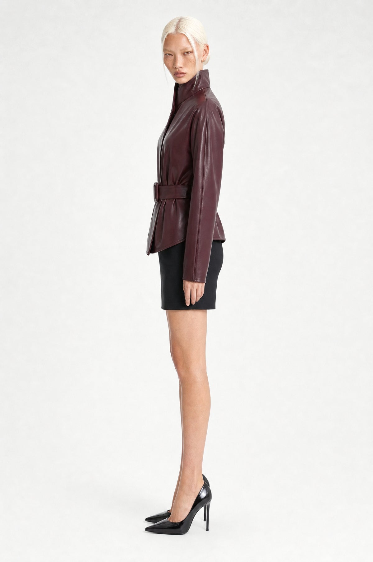 The Soho Faux Leather Jacket in Burgundy, side, looking at camera