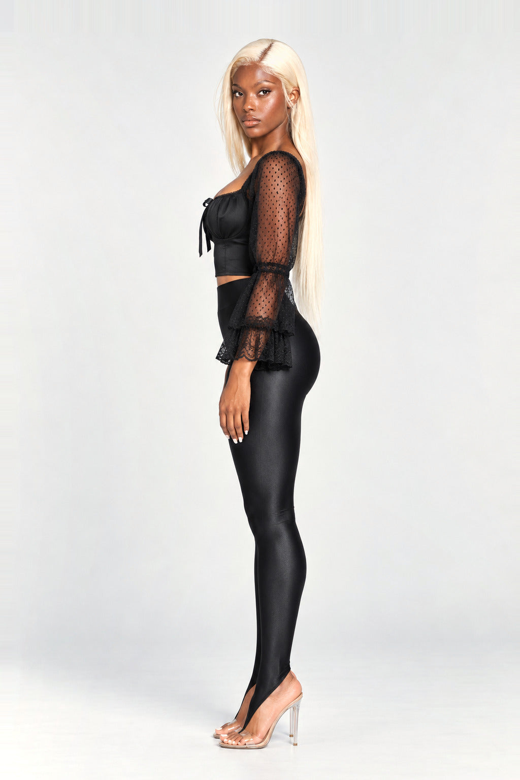 The Pimlico Stirrup Leggings in Black, side, looking at camera