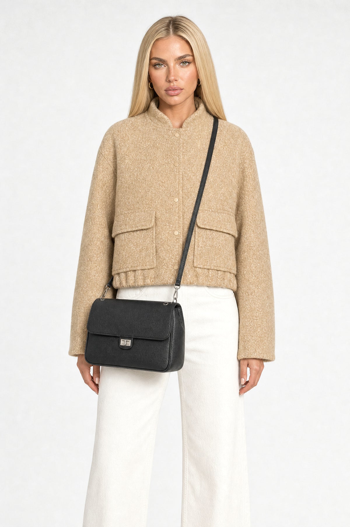 Canonbury Flap Shoulder Bag in Black, worn crossbody on the long strap