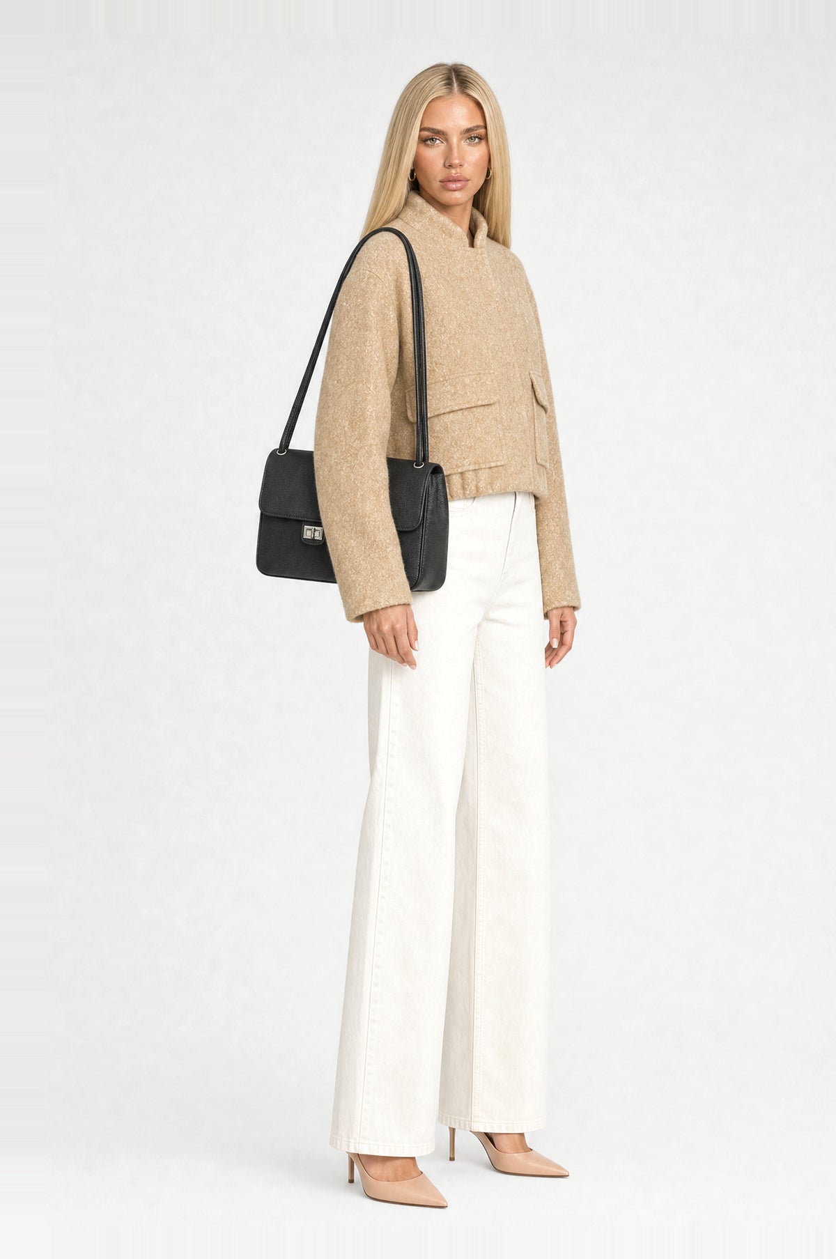Canonbury Flap Shoulder Bag in Black, worn on the shoulder
