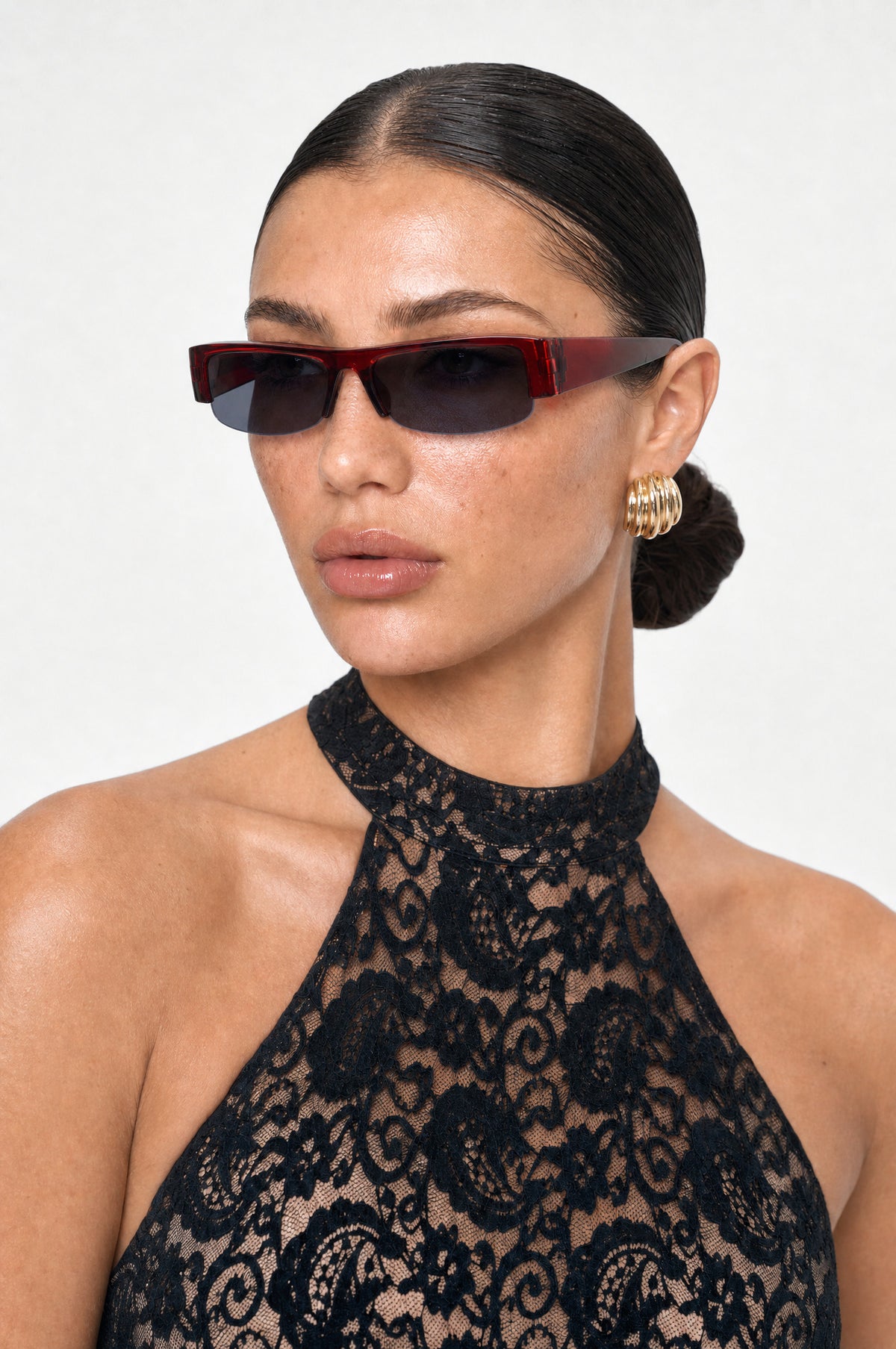 The Barnes Rectangle Sunglasses in Burgundy, worn, three-quarter