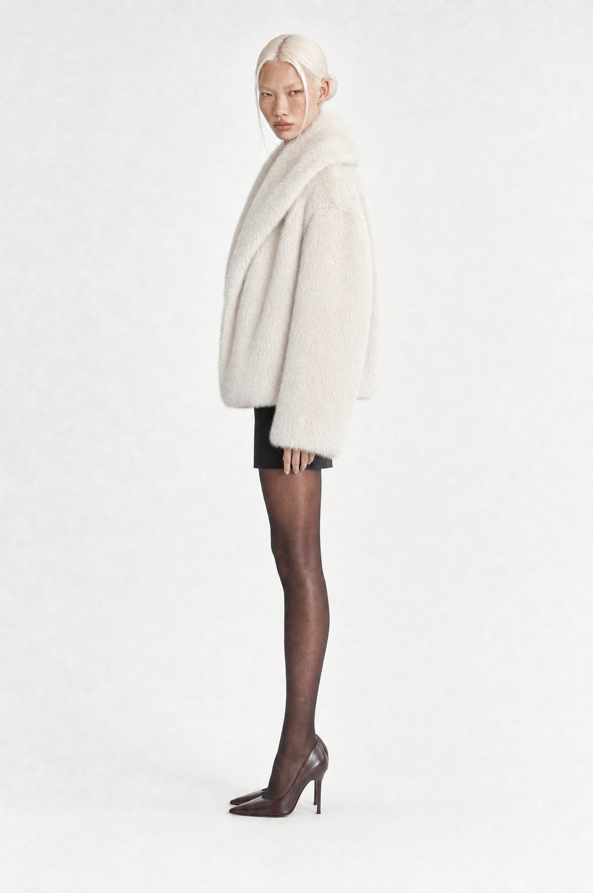 The Belgravia Faux Fur Jacket in Off-White, side, looking at camera