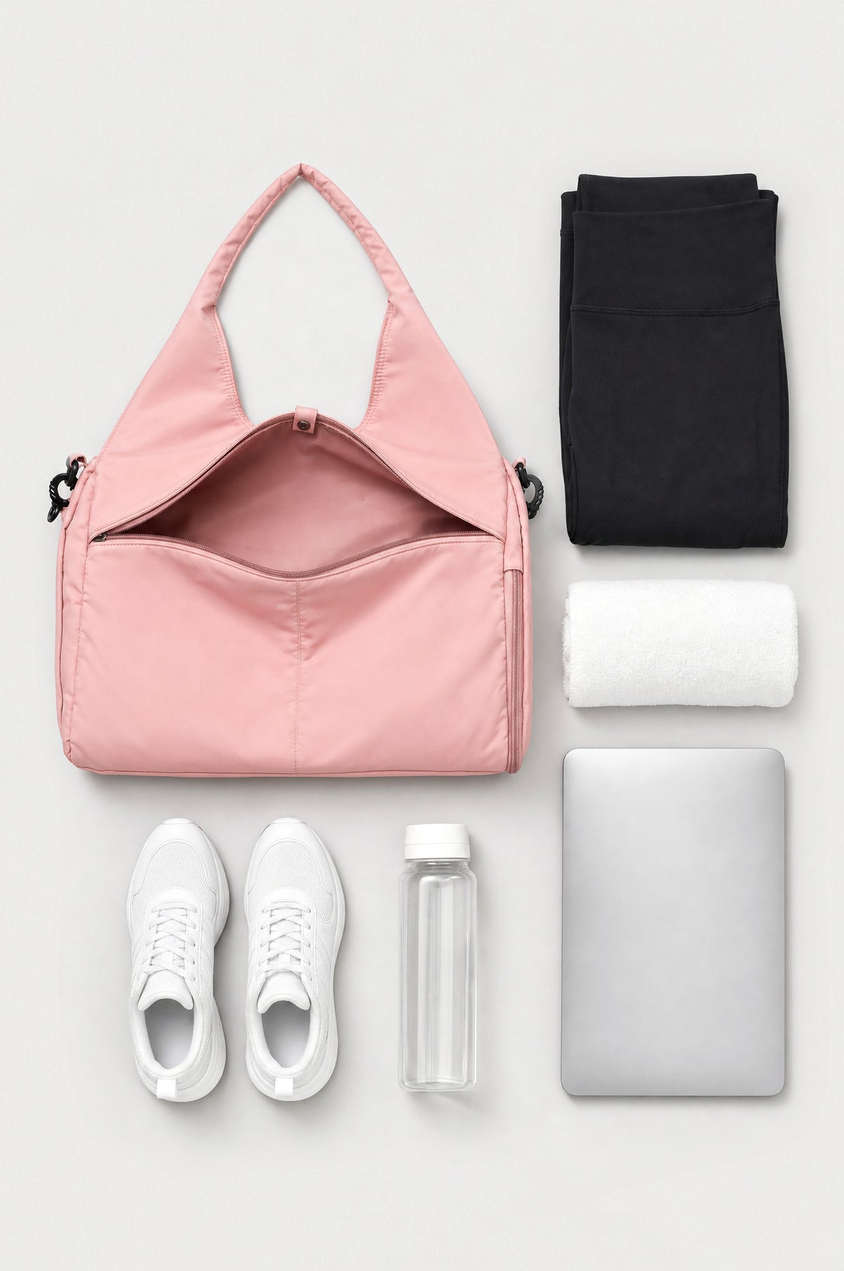 The Greenwich Travel Bag in Pink, what fits inside