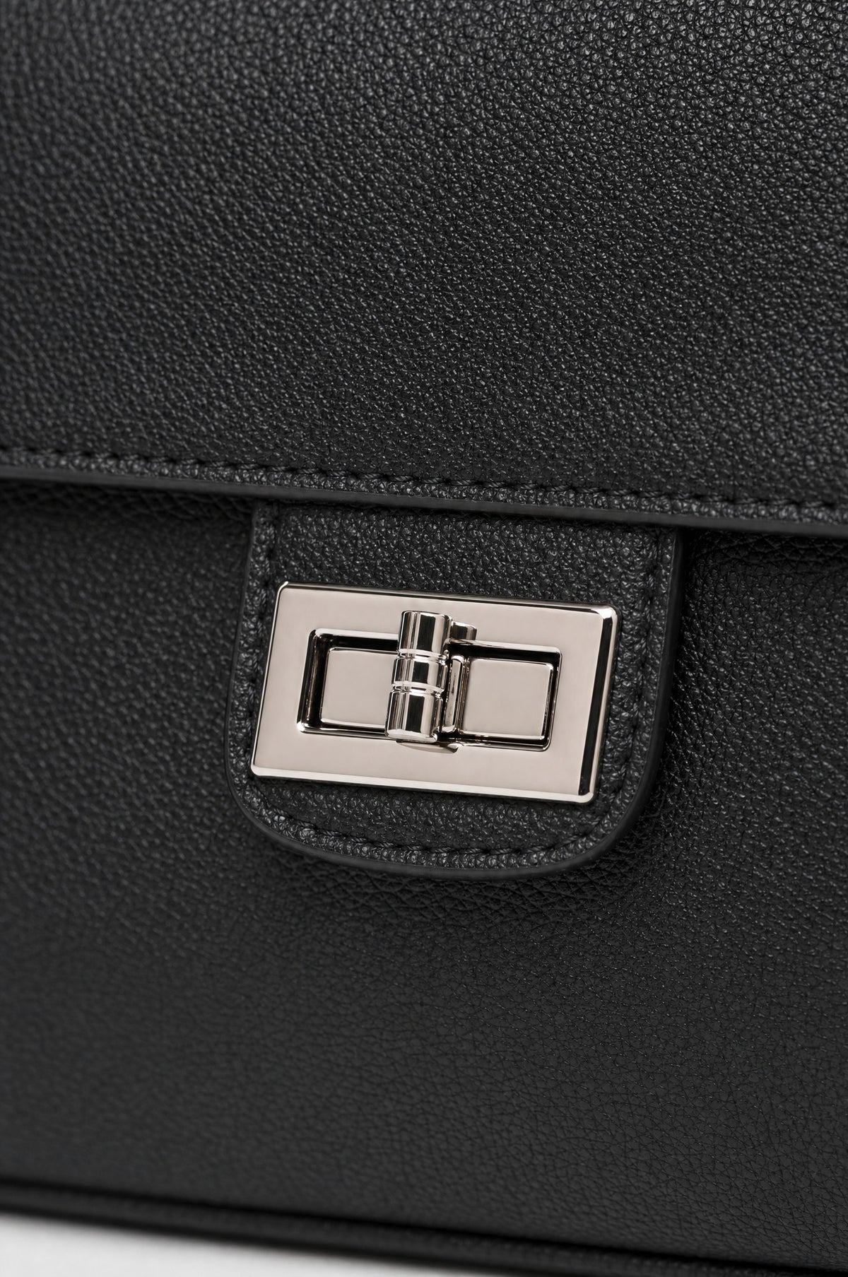 Canonbury Flap Shoulder Bag in Black, twist-lock detail