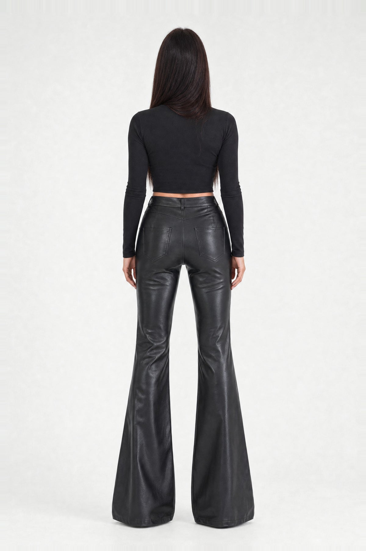 The Fulham Faux Leather Flared Trousers in Black, back