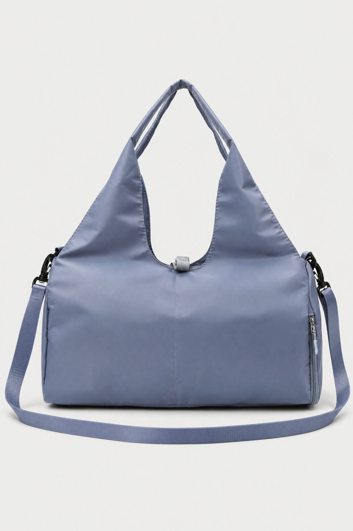 The Greenwich Travel Bag in Misty Blue, bag alone with shoulder strap