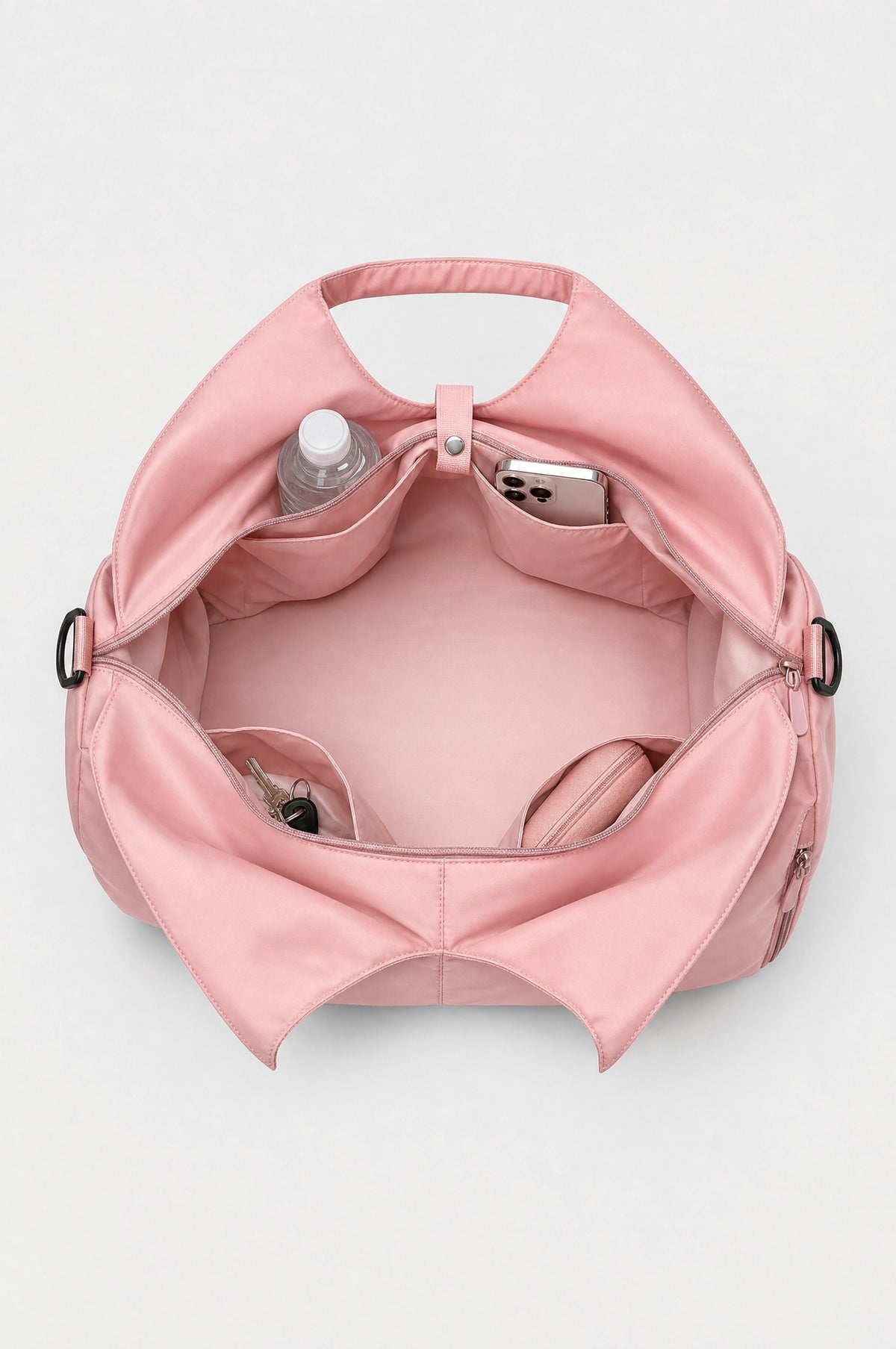The Greenwich Travel Bag in Pink, inside, four inner pockets